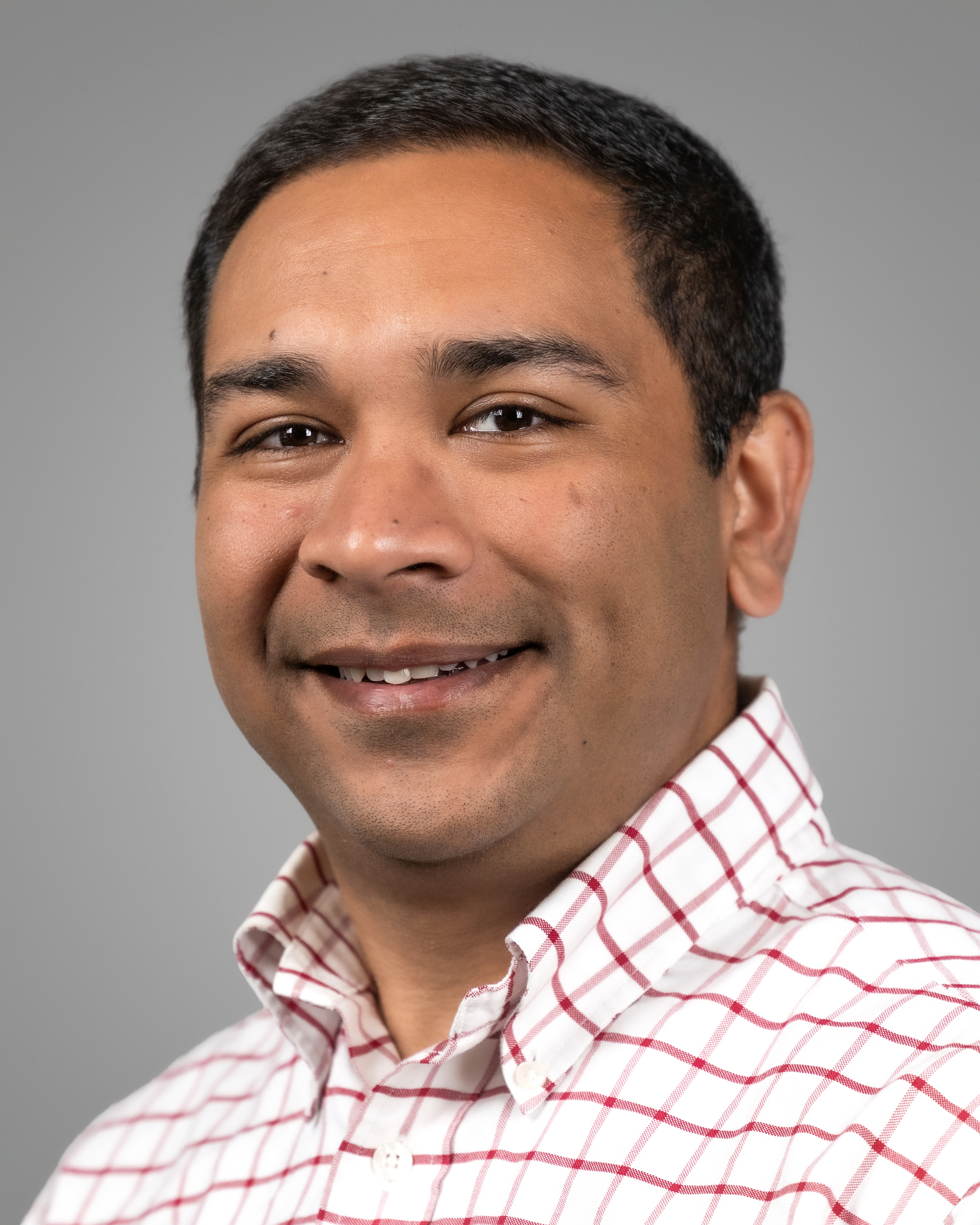 Dr. Hasanali's headshot