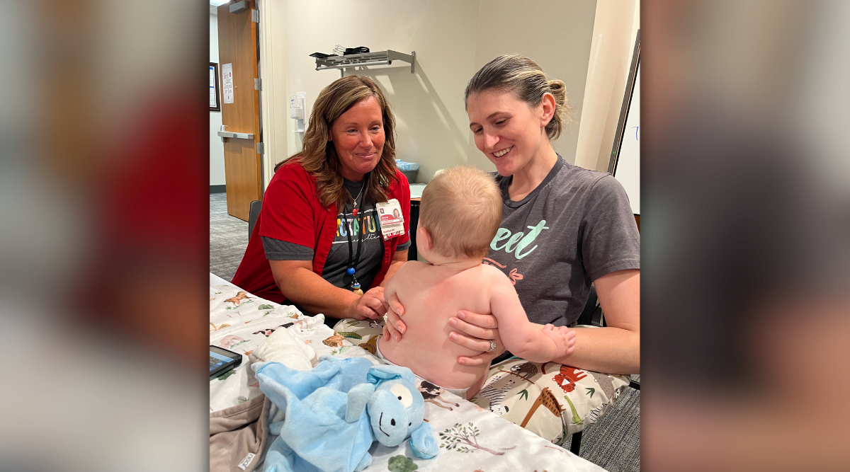 lactation consultant with mom and baby