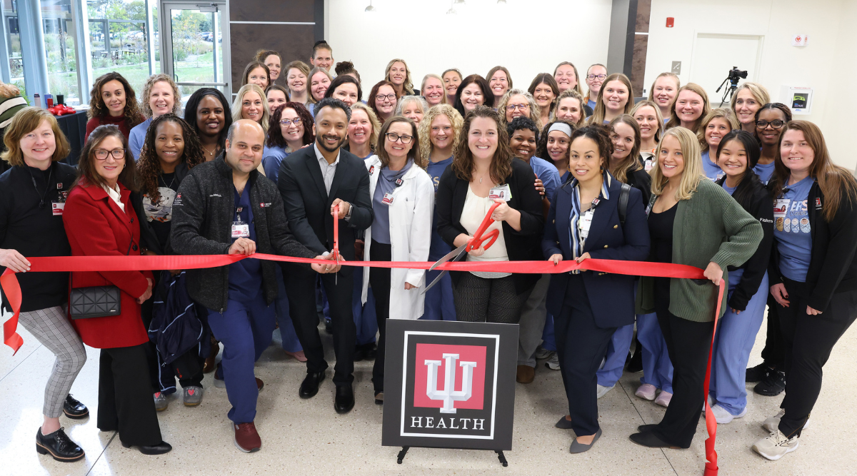 group cutting ribbon