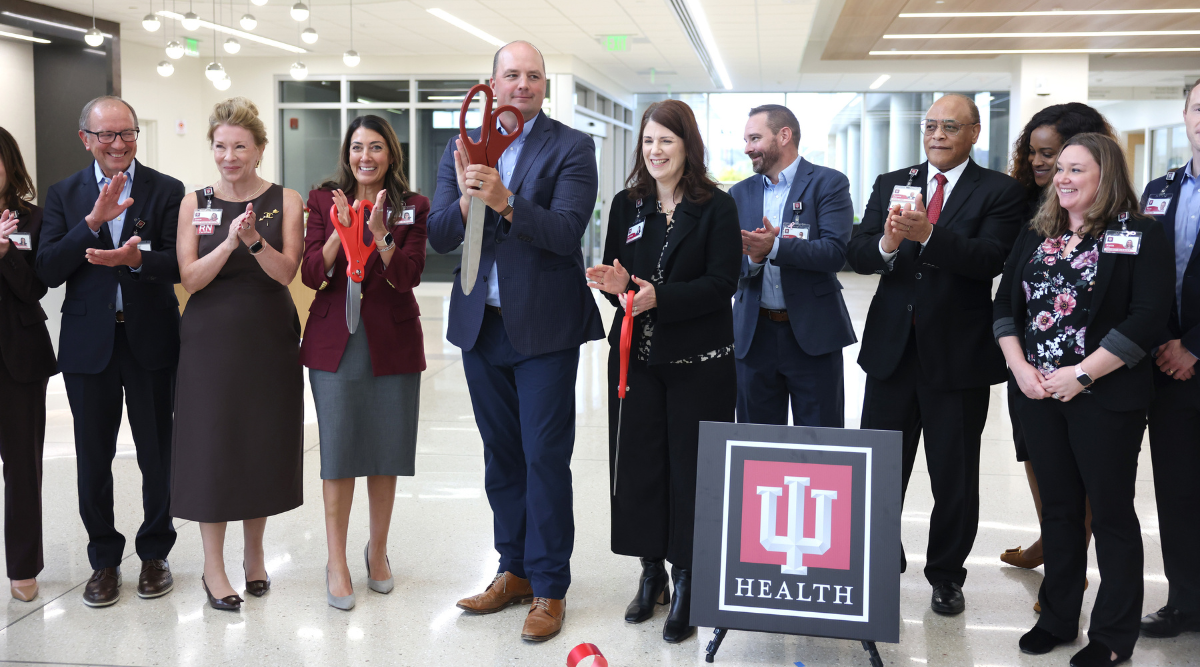 group cutting ribbon