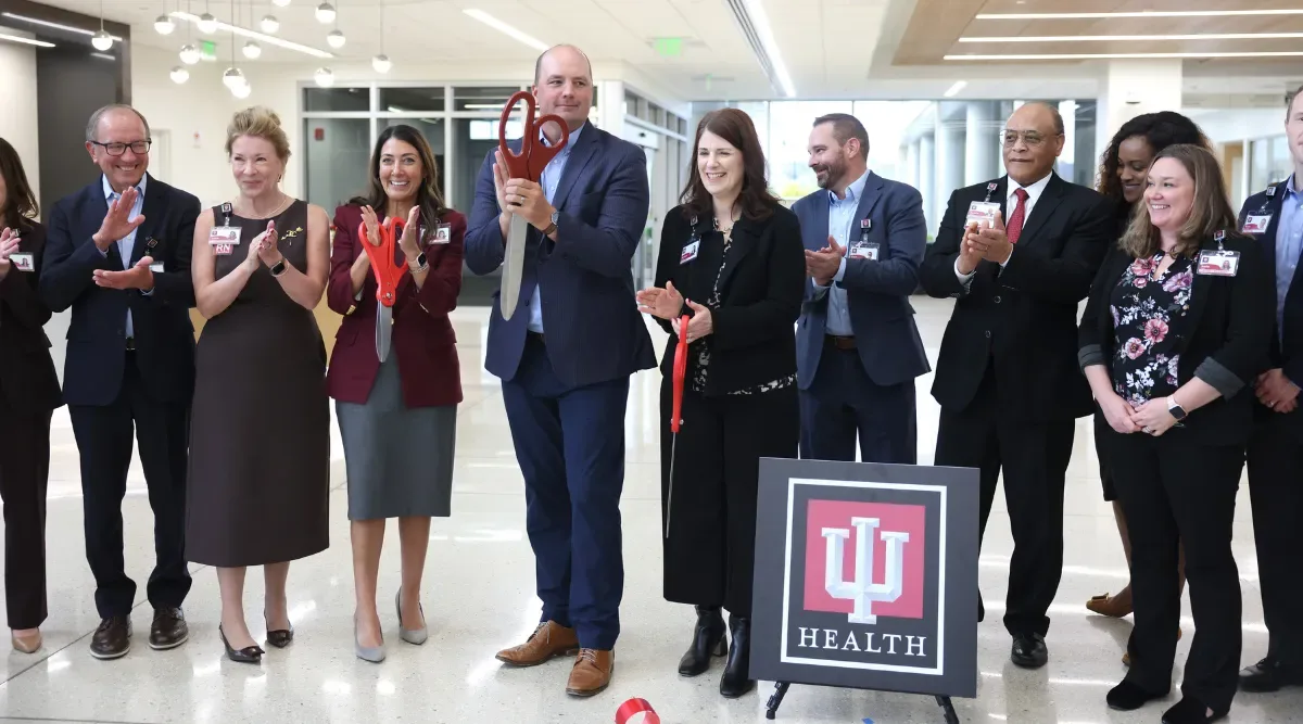 group cutting ribbon