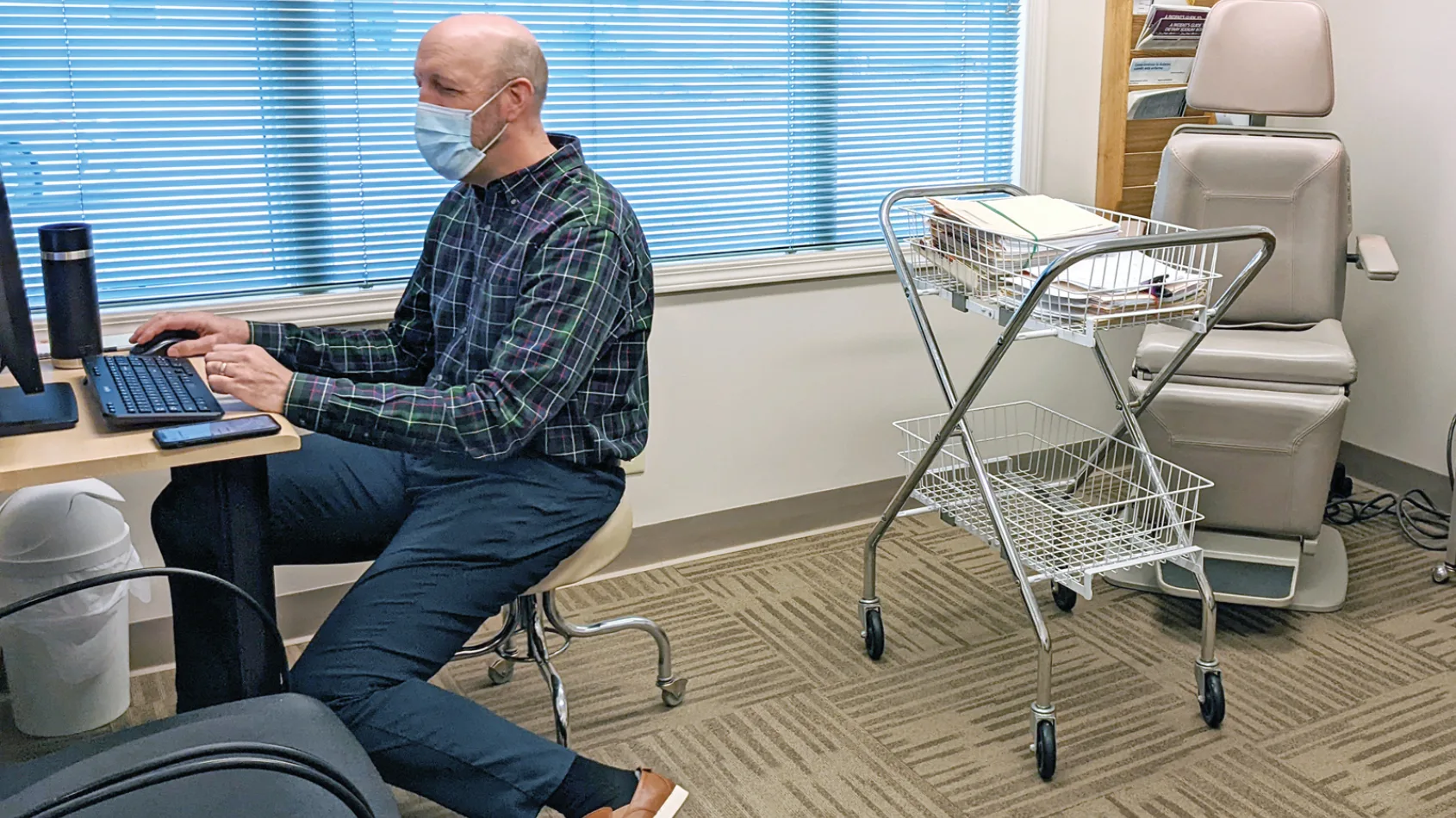 Physician gives back with an open heart at Open Door