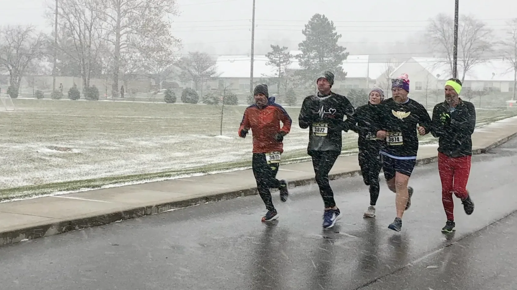 Heart transplant recipient runs 5k with member of rehab team