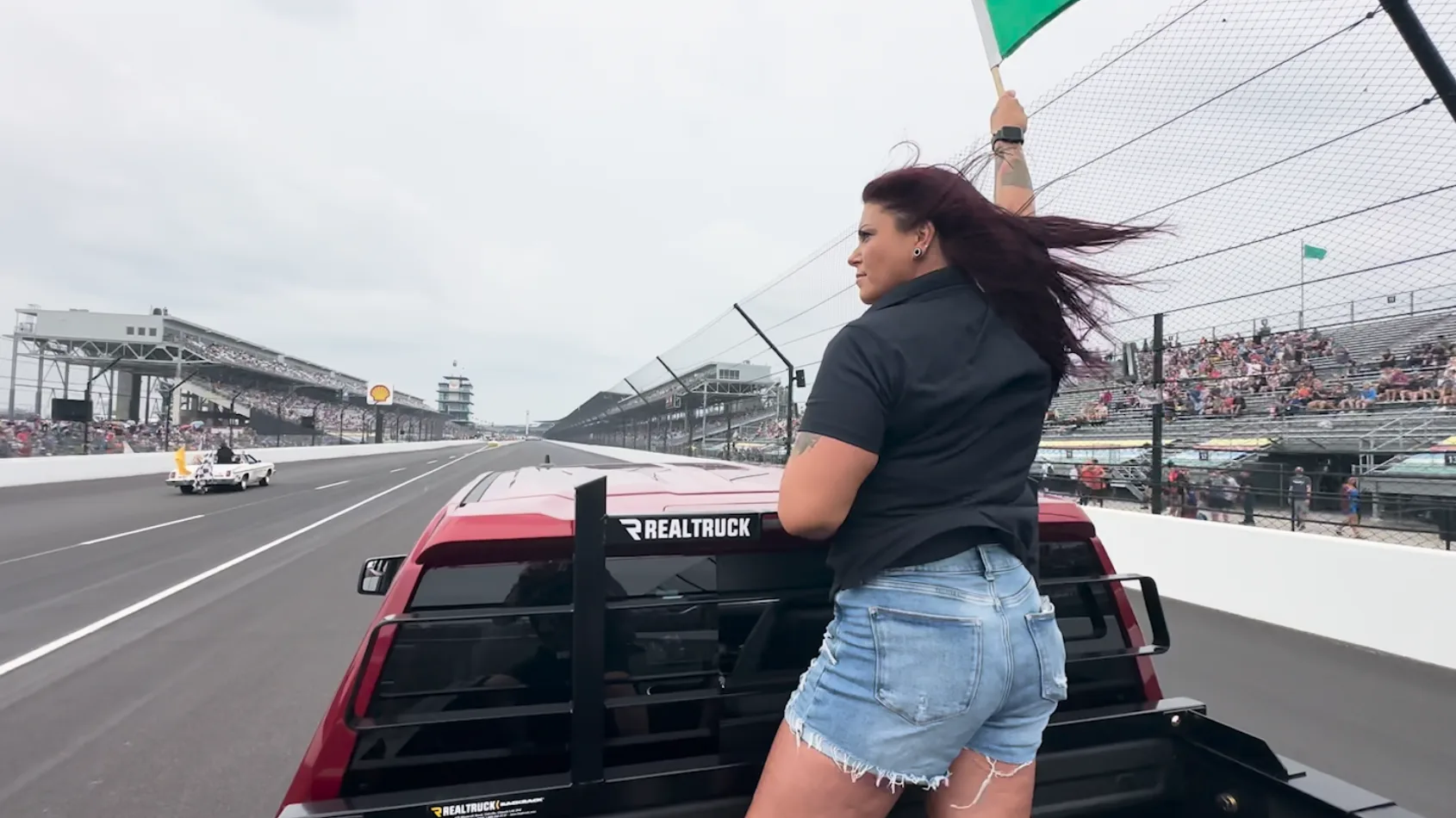 Trauma patient delivers green flag to IMS start line