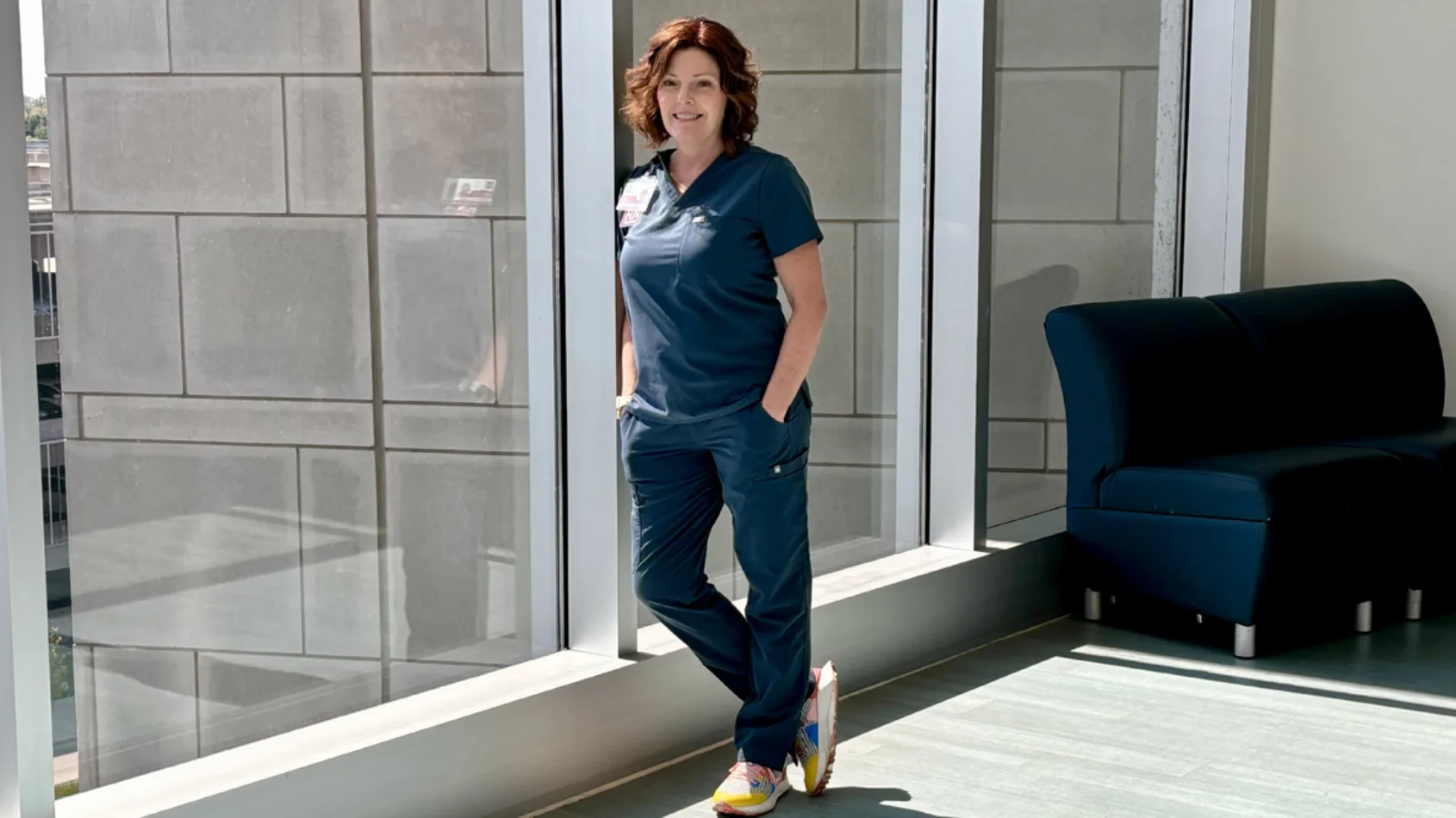 Nurse walks alongside patients with breast cancer