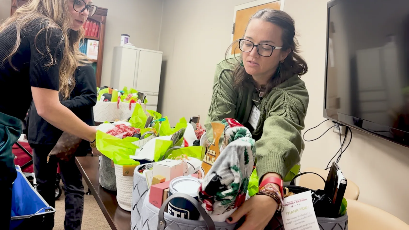 Rev committee delivers brrr baskets and holiday cheer to clinical teams