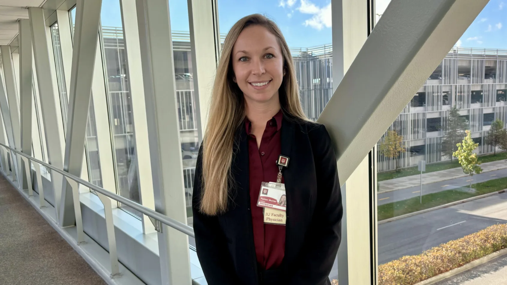 Why does this doctor carry a bottle of holy water in the pocket of her white coat?
