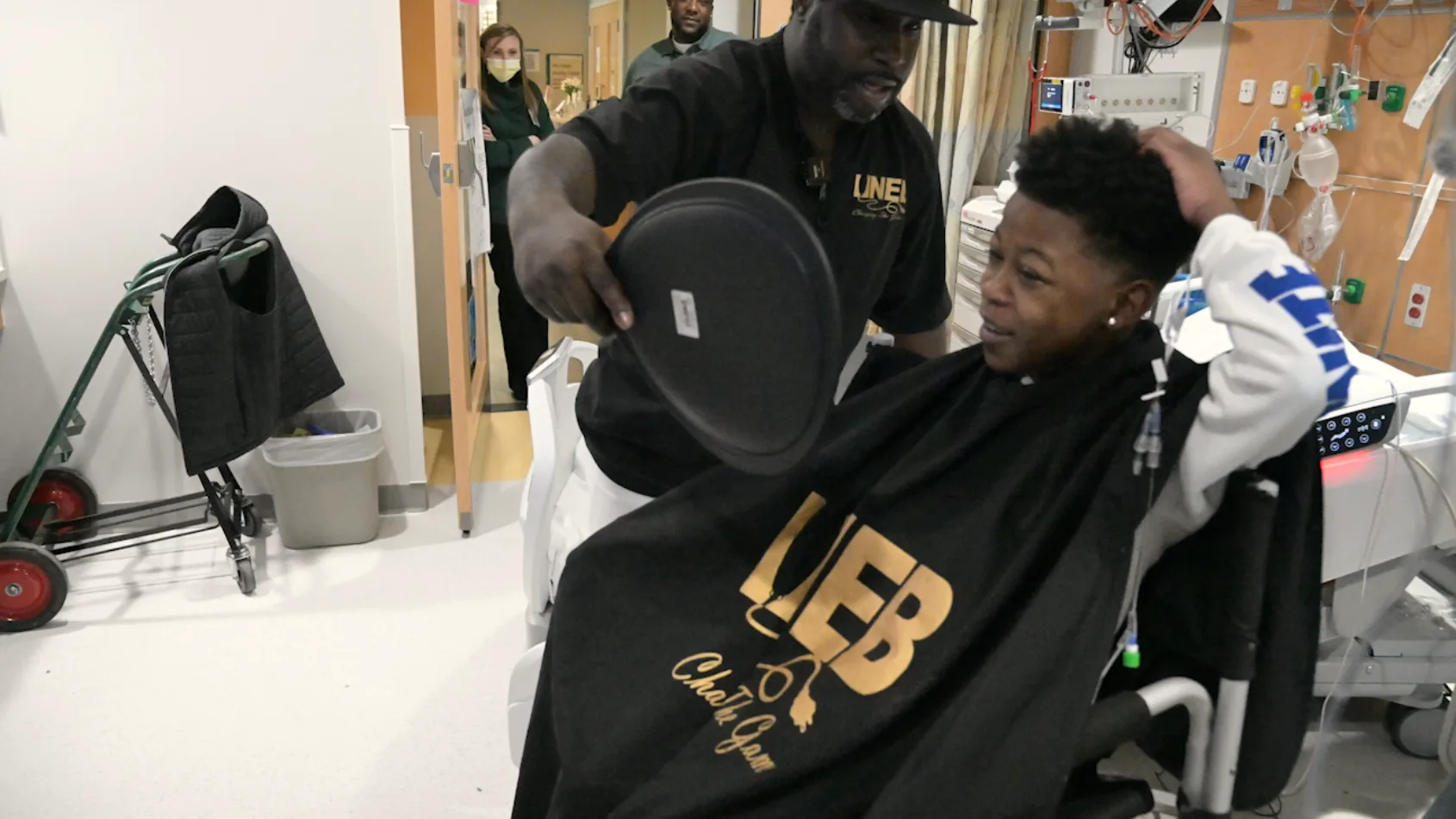 Team member doubles as barber, gives young patient fresh fade