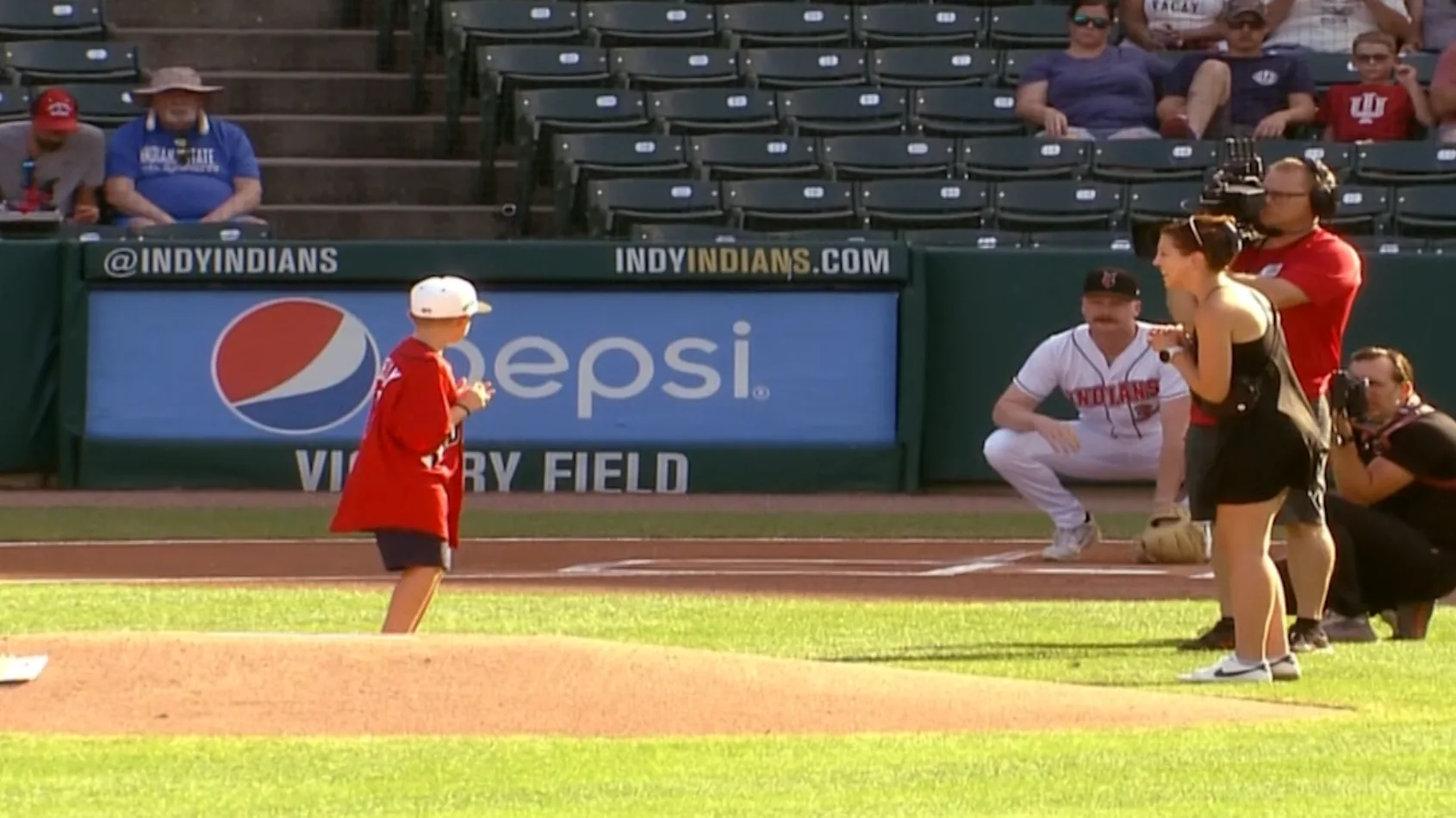 Near death 18 months ago, trauma patient throws first pitch at Indians game