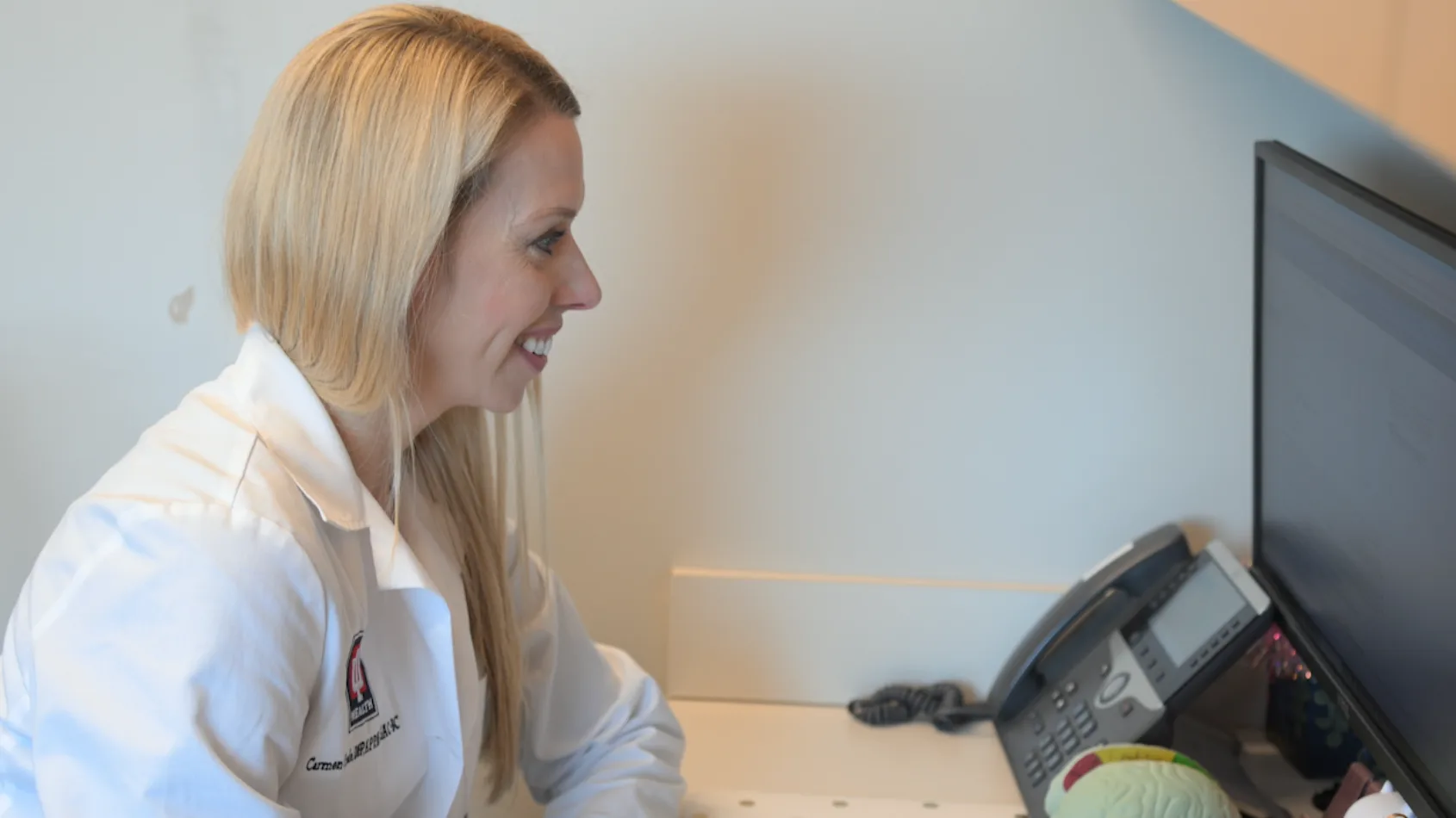 Concussion expert draws on own TBI experience to connect with patients