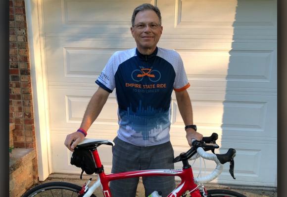 Simon Cancer Center volunteer, cancer patient rides for the cause