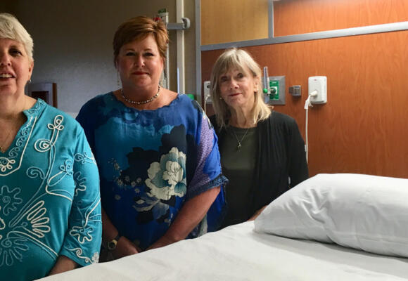 Volunteers sit with patients during final hours