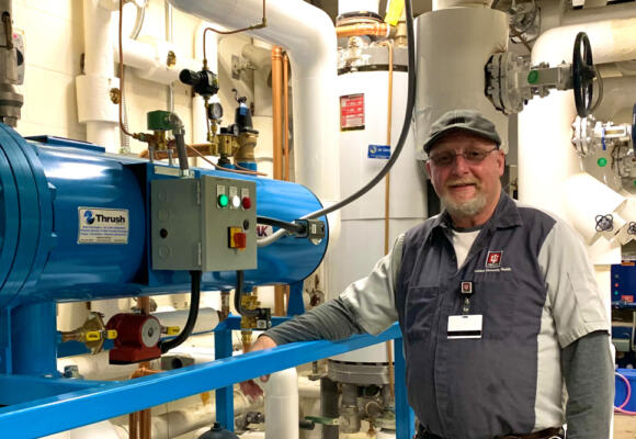 Dedicated hospital employee quietly works behind the scenes