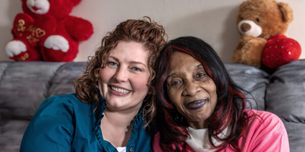 Coaching and care help a patient celebrate a smoke free, cancer free milestone image.