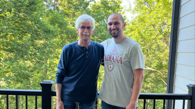 Surgeon supports fellow surgeon image.