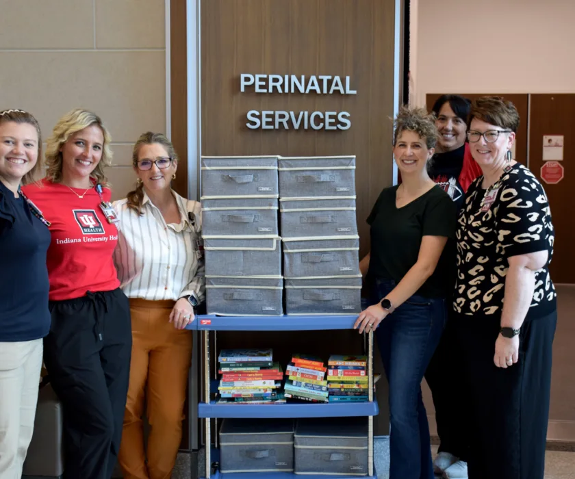 Melissa Nam donating books and memory boxes to IU Health Bloomington Perinatal Services.