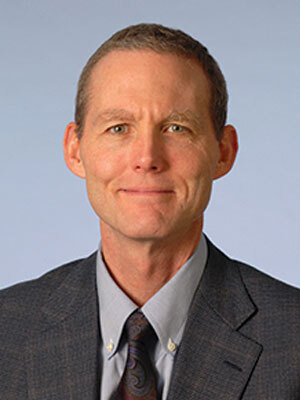 Laurence E Walsh, MD