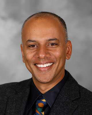 Chandy C John, MD